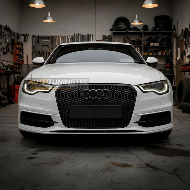 Vista frontale della Audi A6 S6 4G C7 con griglia RS6 Look installata, finitura nero lucido.